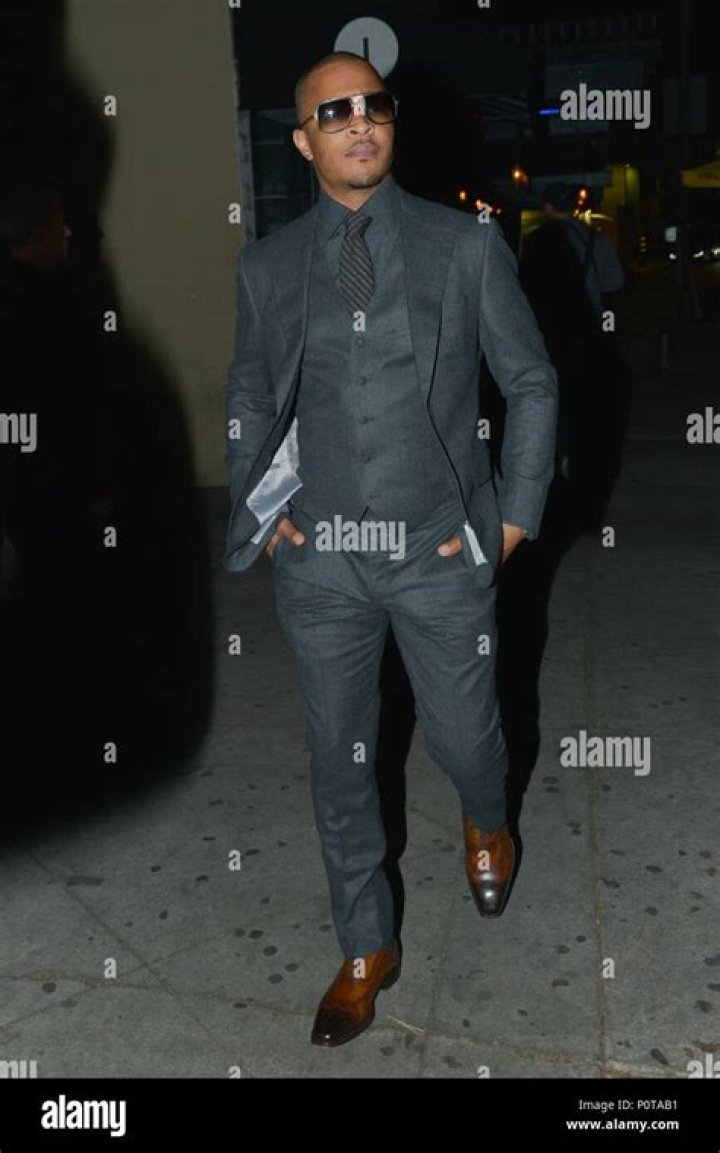 bitchy | Rapper T.I. Arriving At The Stevie Wonder Birthday Party At Peppermint Night Club.