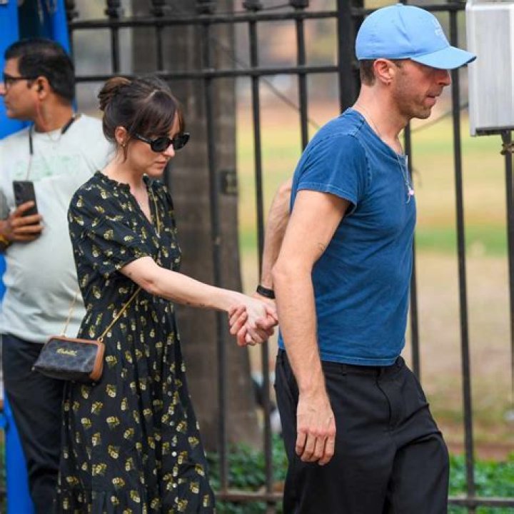 Did Dakota Johnson & Chris Martin get secretly engaged ‘a while ago’?