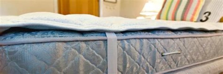 Does a mattress topper go under a mattress pad?