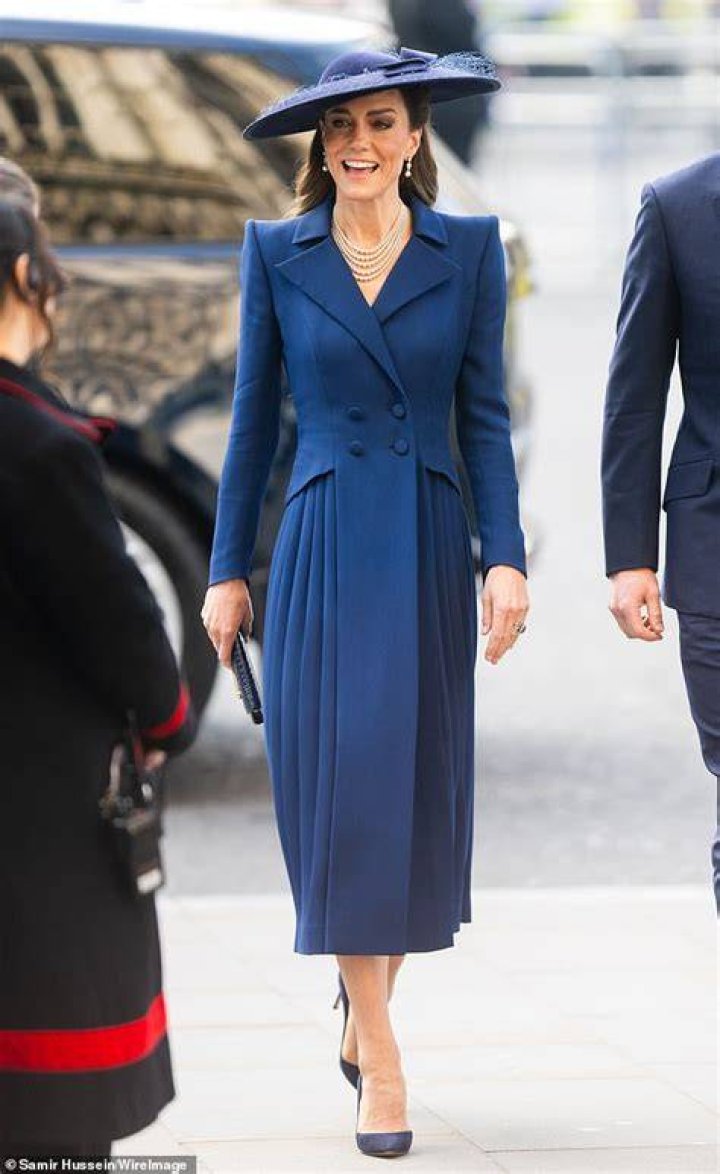	Duchess Kate repeats the same green coatdress she wore one year ago	