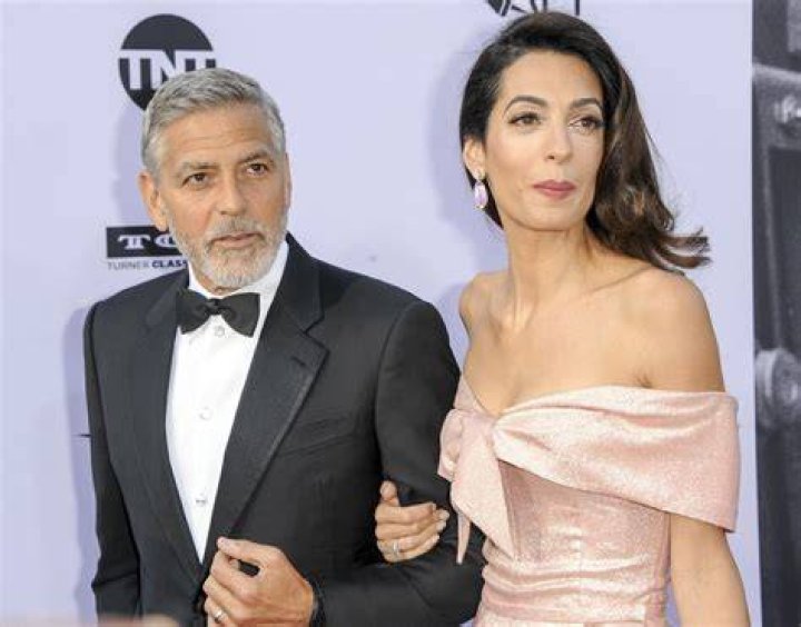 George Clooney hand-writes letters, sews, and stains his home all by himself