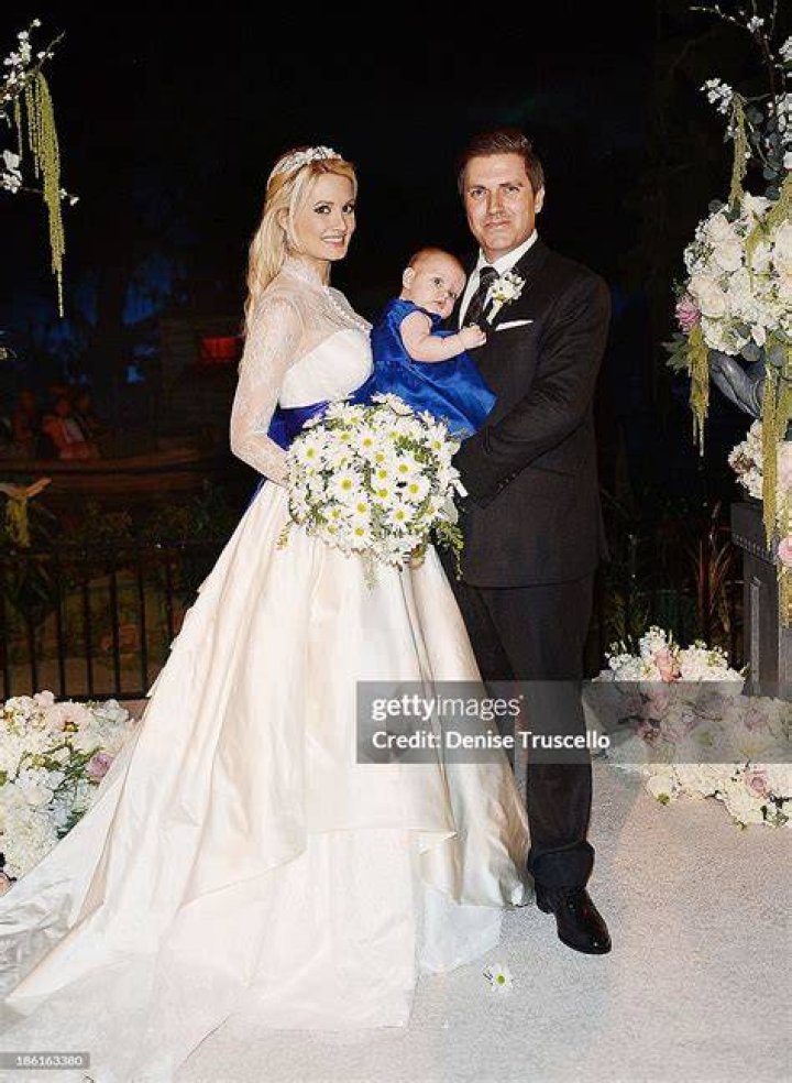 Holly Madison married her baby-daddy Pasquale Rotella at Disneyland. For real.