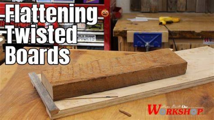 How do you flatten warped wood panels?