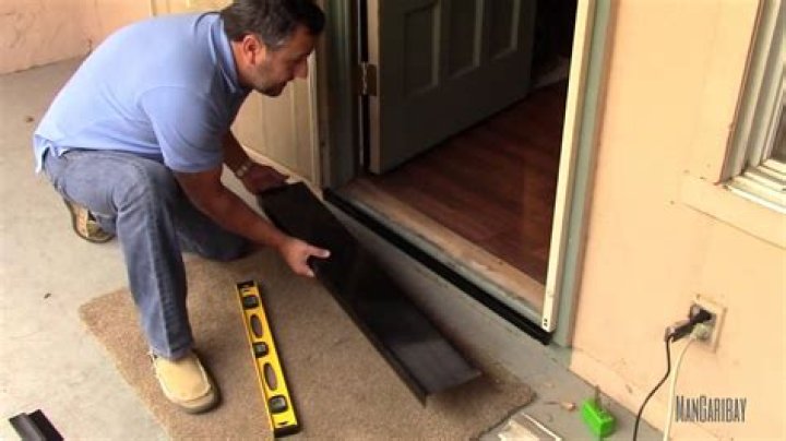 How do you seal a gap under a front door?
