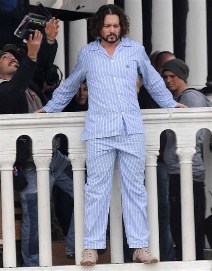 Johnny Depp wanted to wear footie pajamas & bunny ears for ‘The Tourist’