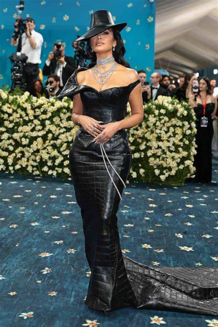 Kim Kardashian’s black suede t-neck dress, with fringe: amazing or terrible?