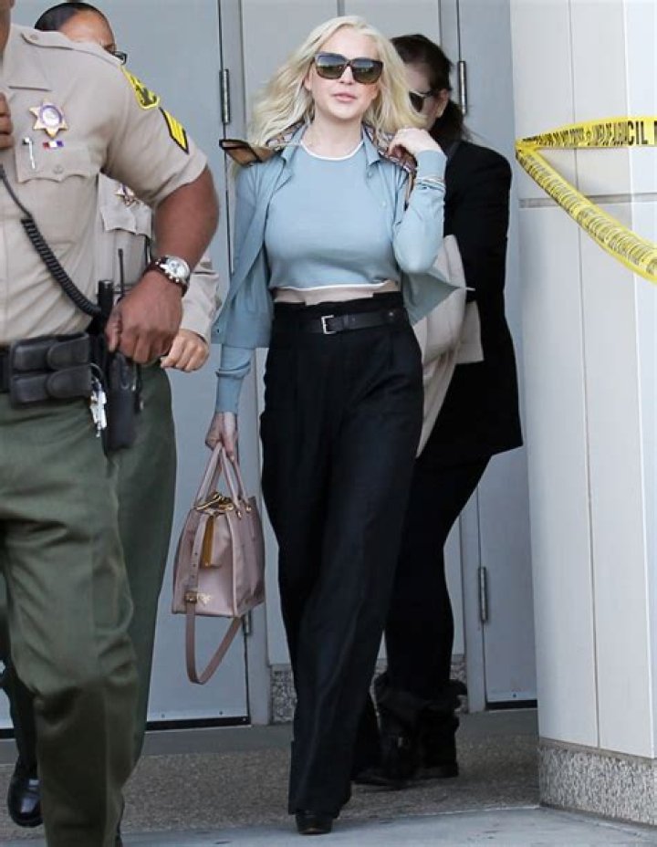 Lindsay Lohan went braless to court again, and she’s getting sued by a crazy dude