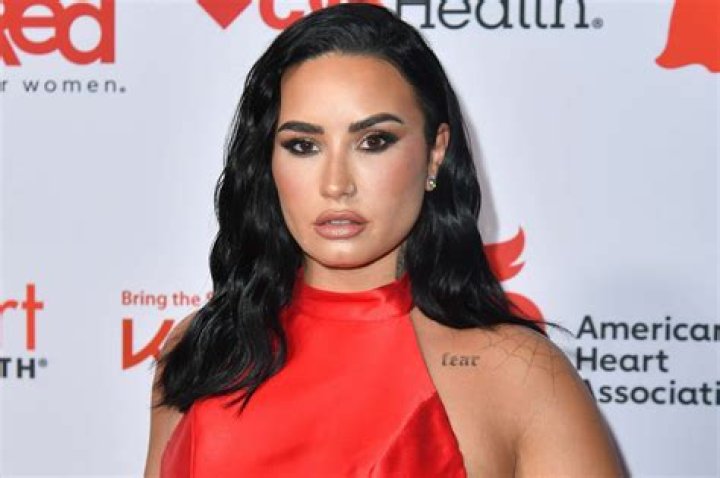 Megan Fox's 'new look' has fans doing a double take as she parties with Taylor and Travis