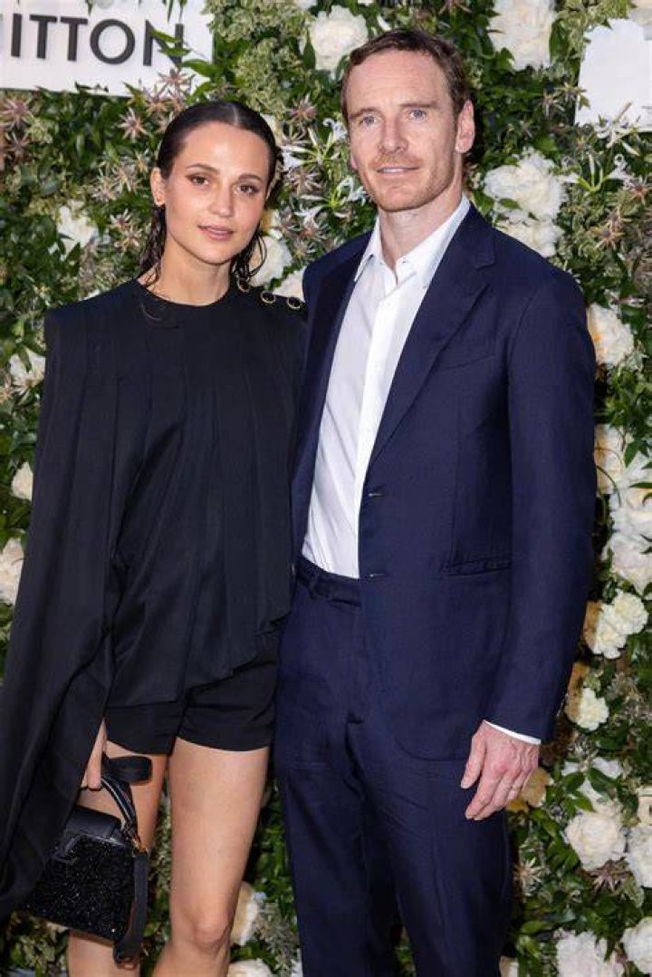 Michael Fassbender & Alicia Vikander pose together for the first time in years
