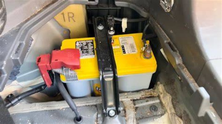 Where is the battery located in a 2010 Dodge Avenger?